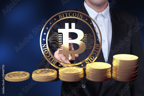 Virtual cryptocurrency concept with golden coins of bitcoin