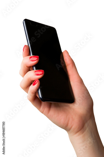 Black phone in an elegant female hand.