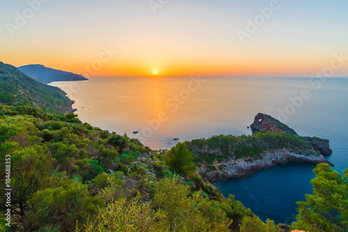Sunset in Puesta de Sol en Sa Foradada, Palma Mallorca islands, Spain. photo