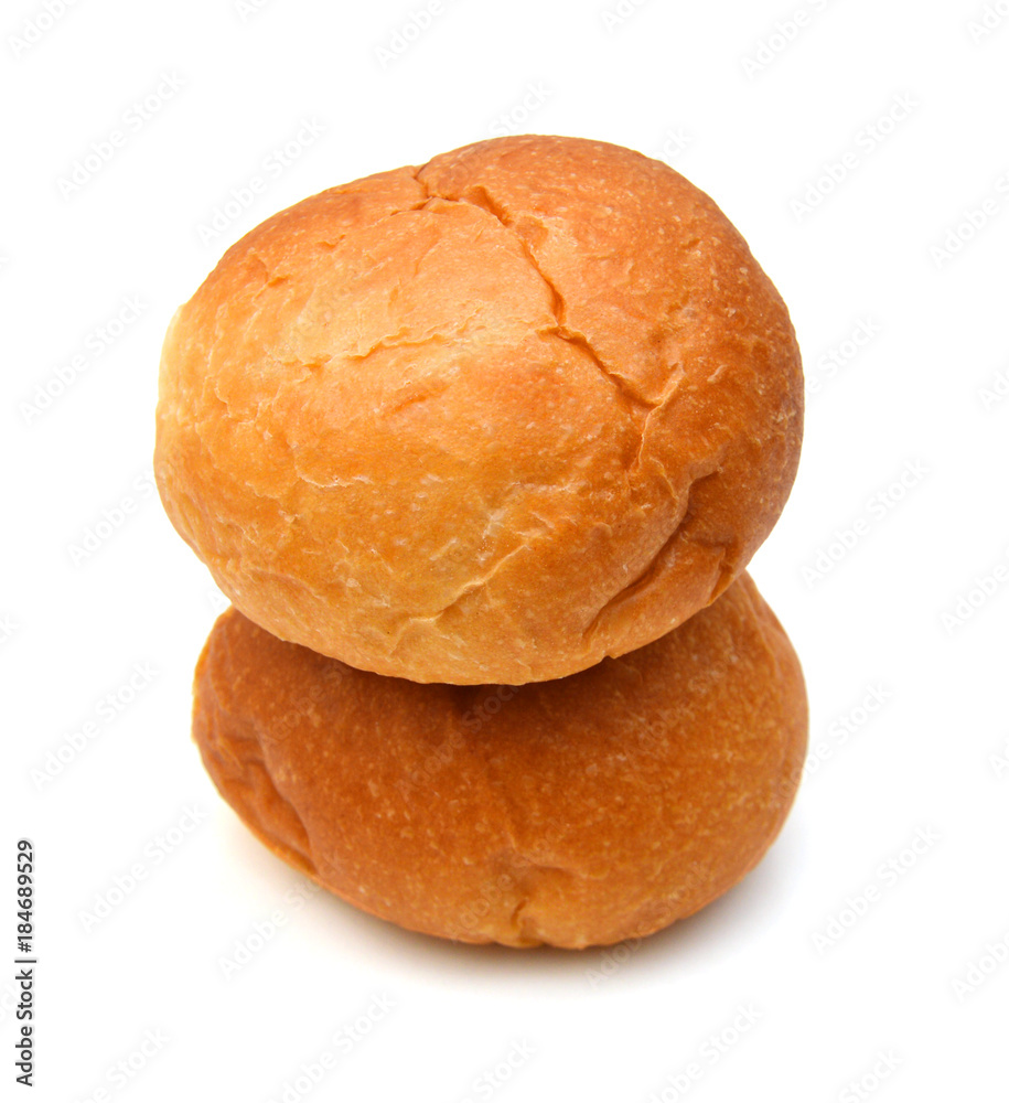 Freshly baked loaf of bread, hot and steaming on white Freshly baked loaf of bread, hot and steaming on white