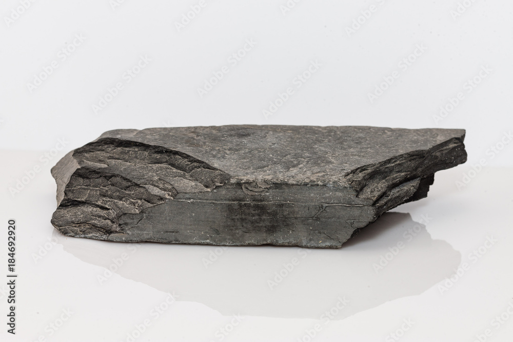 flat brick shaped rock found many years ago - obrazy, fototapety, plakaty 