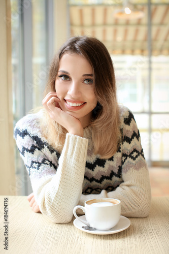 Attractive smiling woman in...