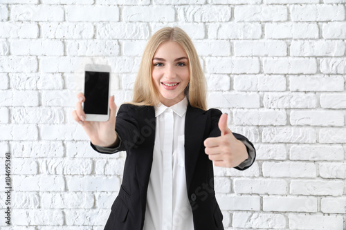 Emotional businesswoman wit...