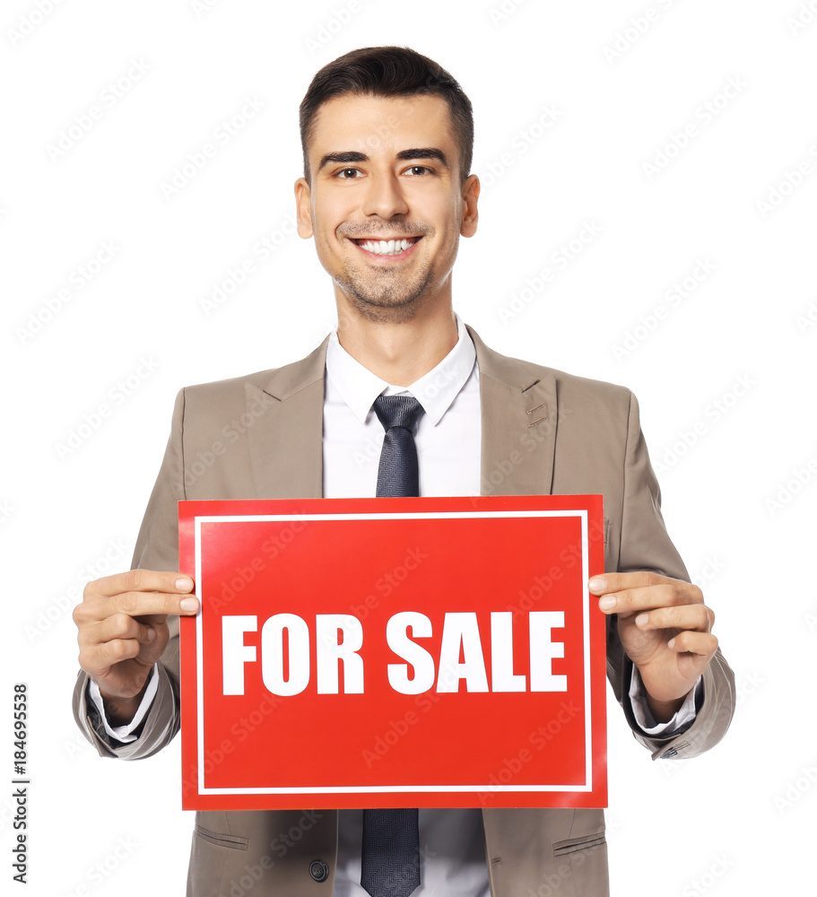 Attractive real estate agent holding Attractive real estate agent holding