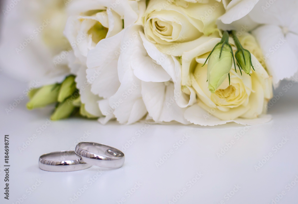 Engagement rings and wedding bouquet Engagement rings and wedding bouquet