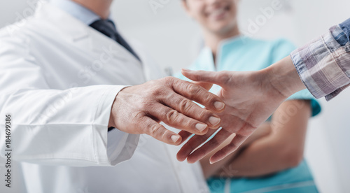 Medical staff welcoming a patient