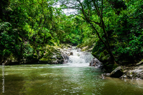 Beautiful outdoor view of the Minca waterfall surrounding of nature, Santa Marta, Colombia