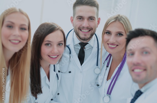 Smiling Team Of Doctors  At Hospital Making Selfie