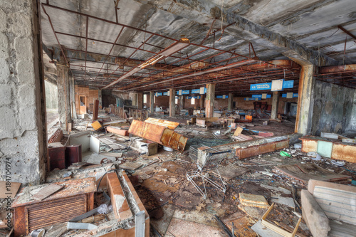 Ruined supermarket in overgrown ghost city Pripyat.