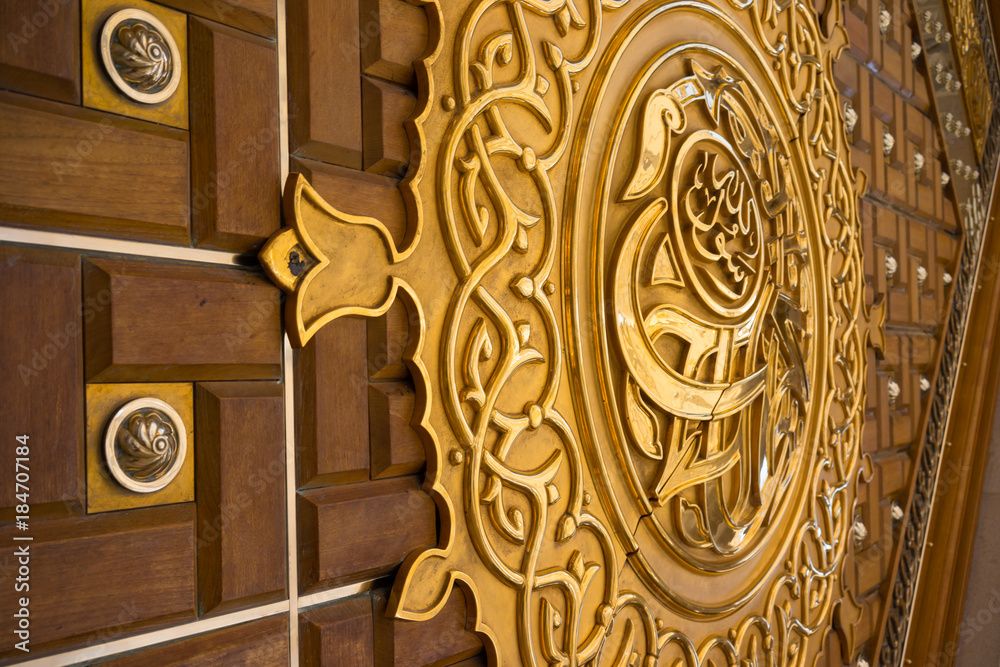MEDINA, SAUDI ARABIA - 16TH NOV 2017; Close-up view of golden door for Mosque  Al-Nabawi