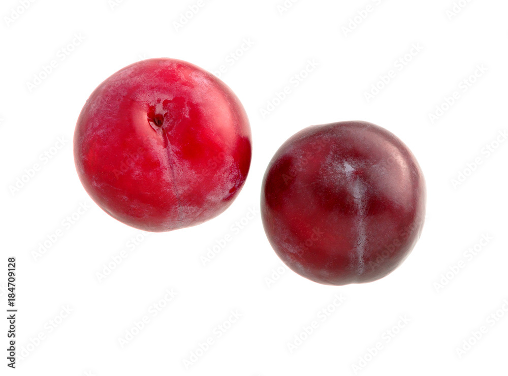 Sweet plum. Two red plums isolated on white. Ripe plum fruit