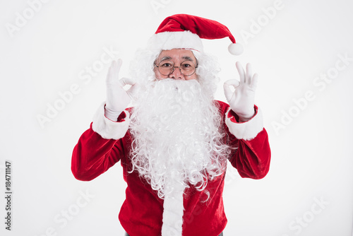 Portrait of a happy Santa cross on a white background, Winter holiday, Merry Christmas and happy new year concept