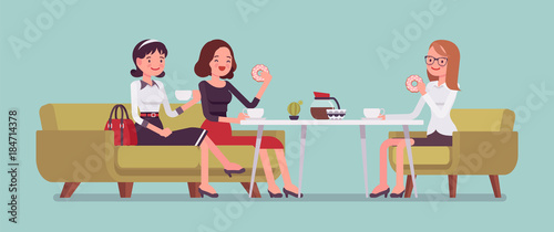 Girls sitting in a cafe