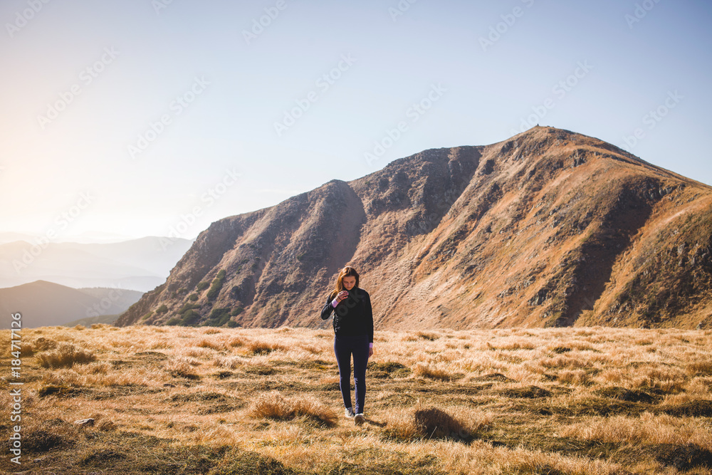 Girl Walking in Carpathian Mountains