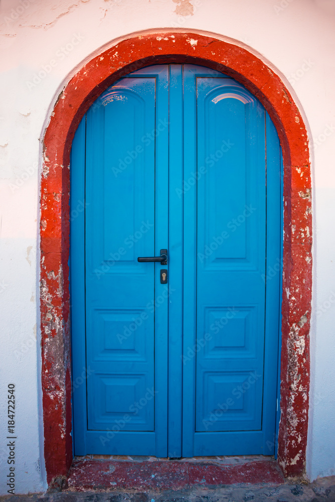 Shabby blue door Santorini Island in Greece Shabby blue door Santorini Island in Greece