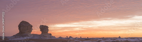 Pink sunset panorama in the White desert photo