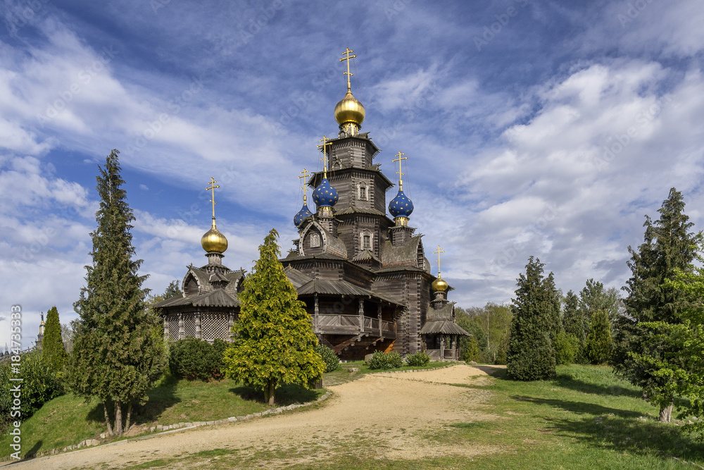 ancient wooden Russian orthodox church ad summer day