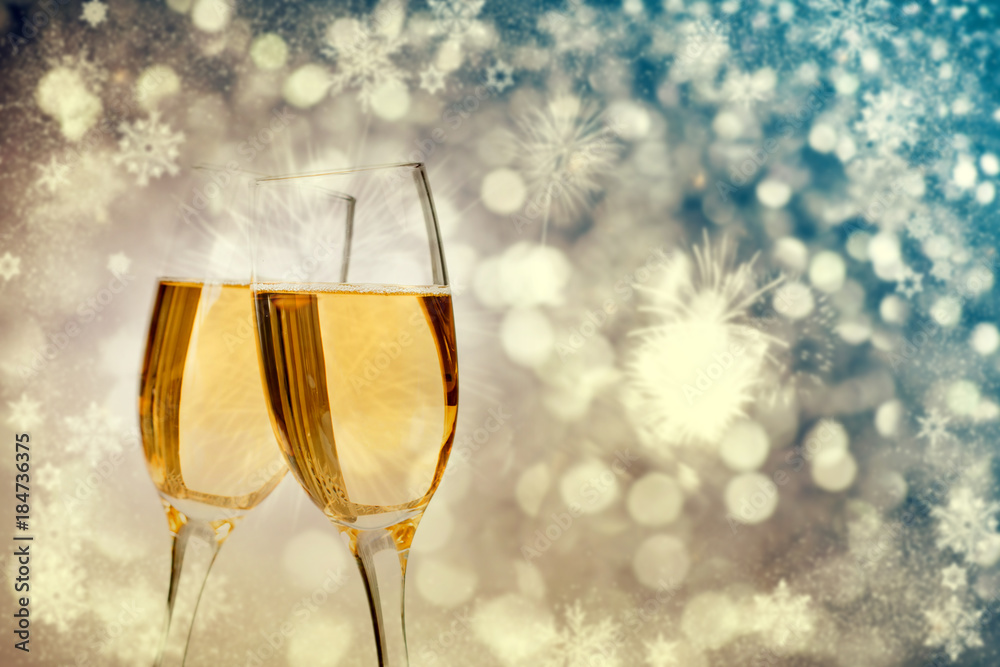 Champagne glasses on sparkling background Champagne glasses on sparkling background