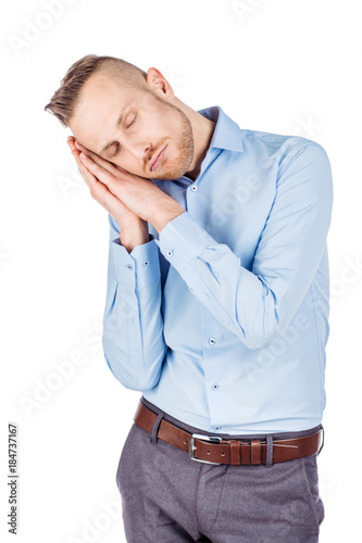  man yawning stretching arms. emotions, facial expressions, feelings, body language, signs. image on a white studio background.