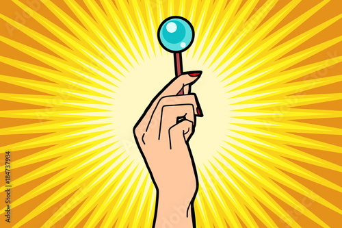 Lollipop in female hand