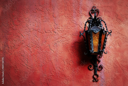 Lamp On Red Stucco Wall