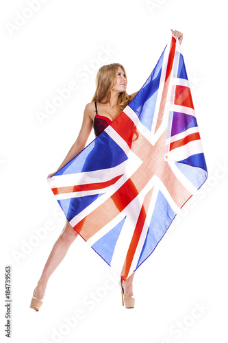 Young woman holding a large transparent British flag