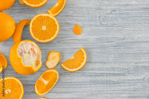 Fresh ripe oranges on wooden background
