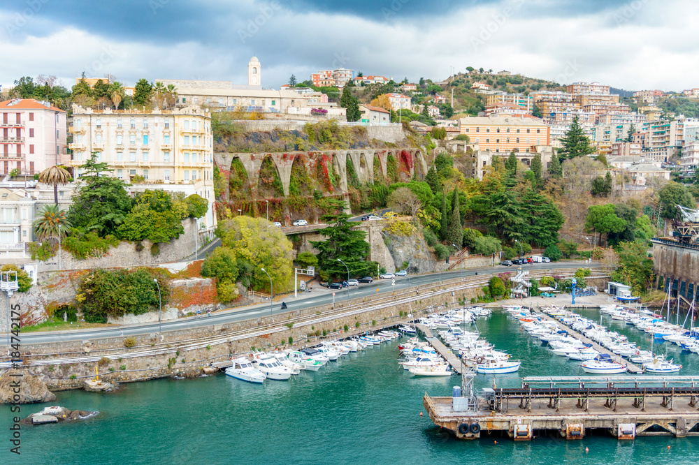 Seashore with road, buildings and marina top view, Savona, Italy