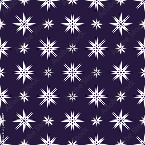 the white eight-pointed shapes  snowflakes  form a seamless pattern on an ultra-violet background.