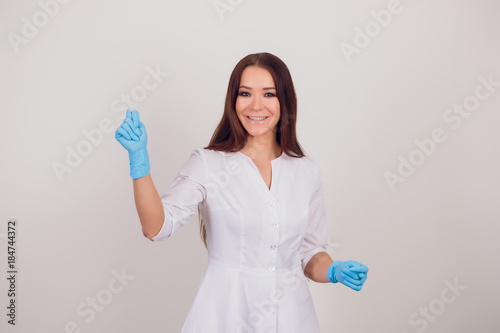 Beautiful female medicine doctor with smile face. Medical care, illness diagnosing, physical, physician consultation, insurance concept. Dermatologist or oncologist examination photo