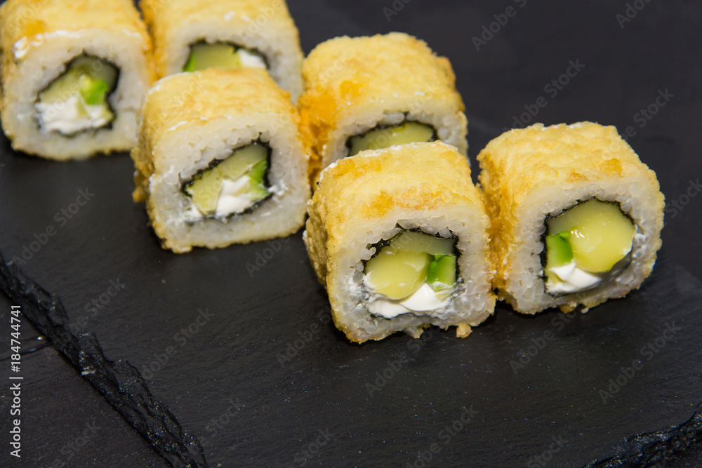 Hot Sushi roll with salmon. Japanese food. 4 Hot Sushi roll with salmon. Japanese food. 4