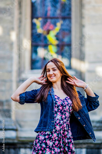 A girl walking along the street