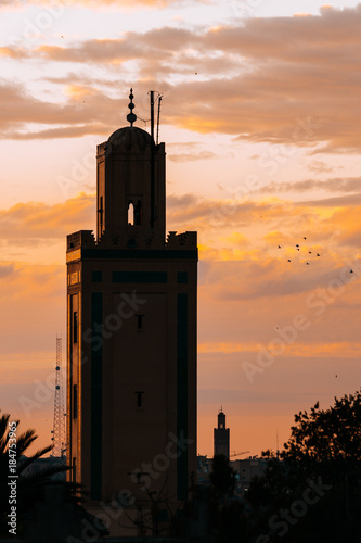 silhouetted minaret tower at marrakech