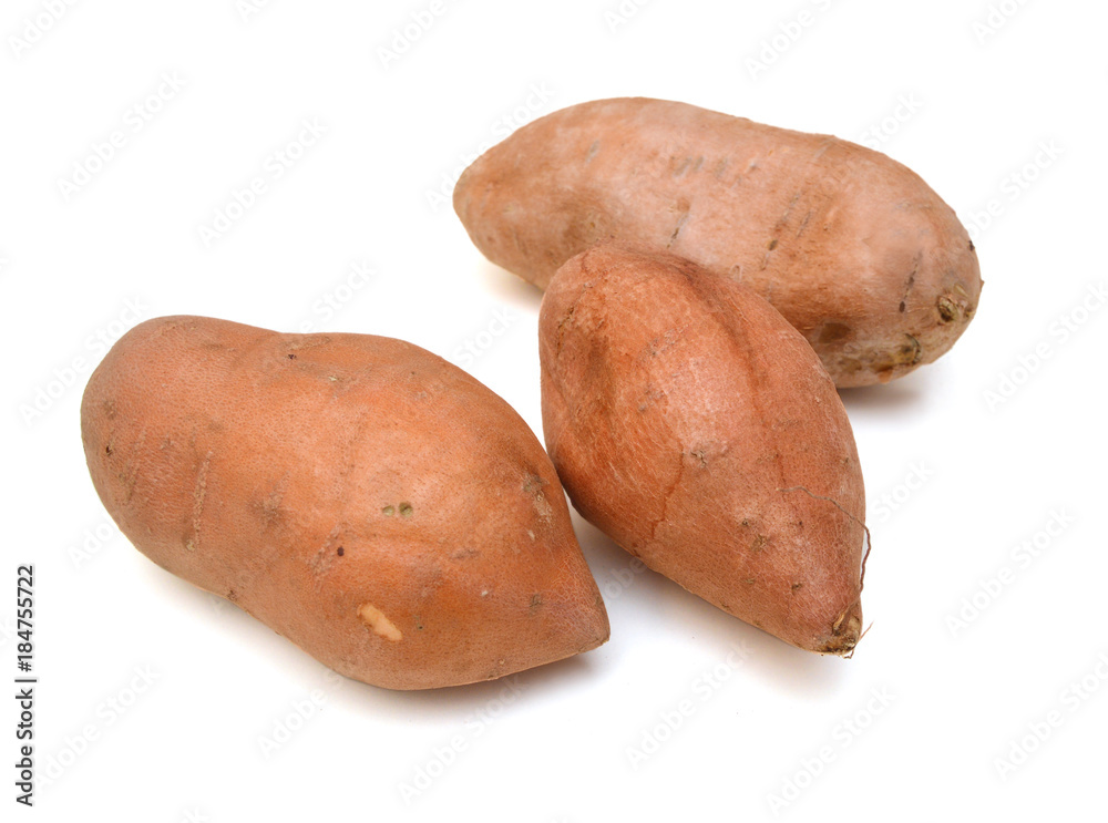 Sweet potatoes on a white background. Sweet potatoes on a white background.