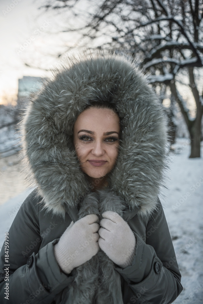 young woman in fur coat on cold day young woman in fur coat on cold day