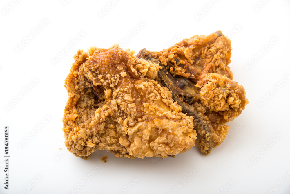 isolated fried chicken thighs on whte background isolated fried chicken thighs on whte background