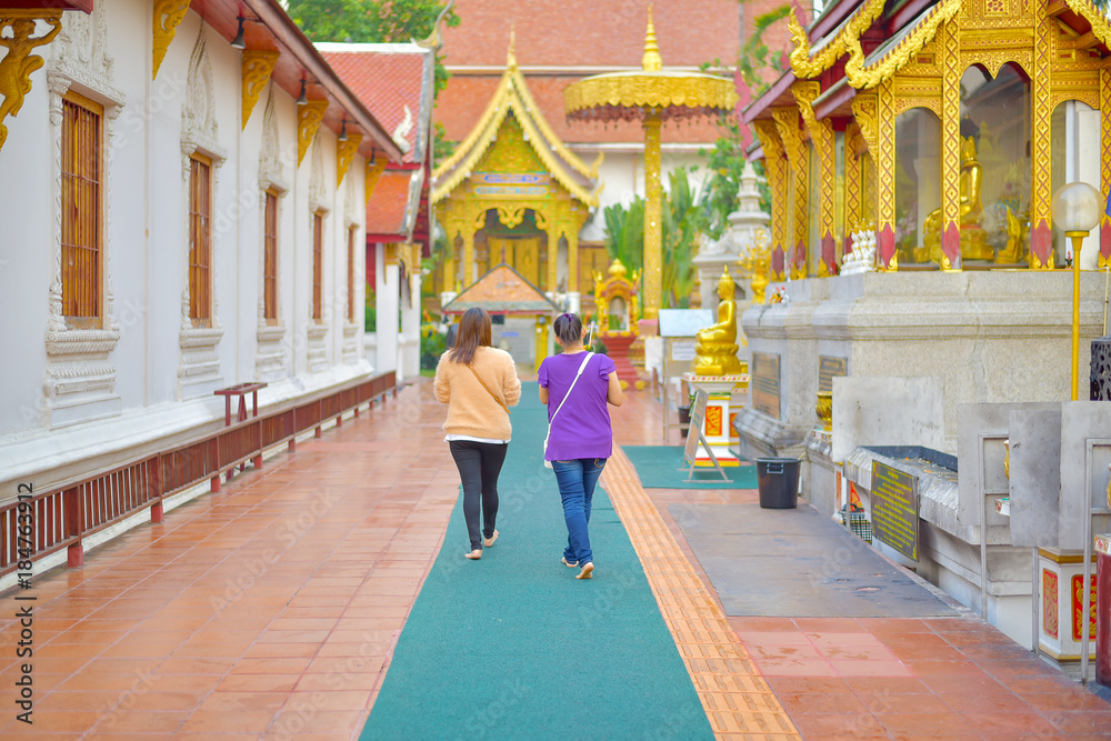 People walking in the temple