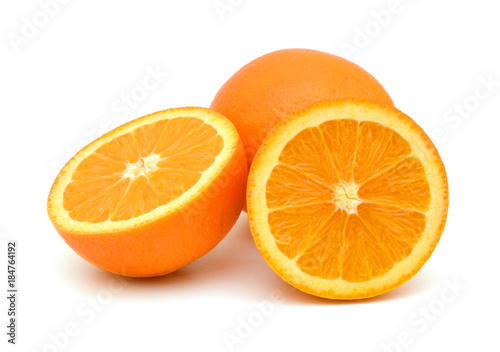 fresh orange fruits cut isolated on white background