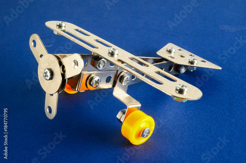Small toy metal plane airplane