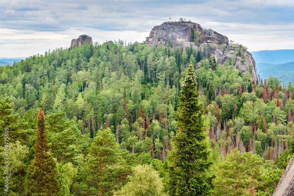 View of the Second pillar with inscription Freedom. Russian reserve Stolby Nature Sanctuary. Near Krasnoyarsk