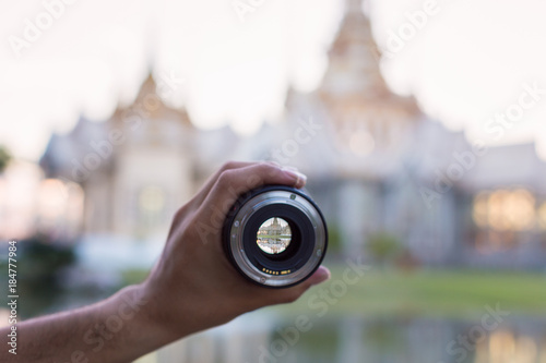 white famous temple in thailand view through the camera lens