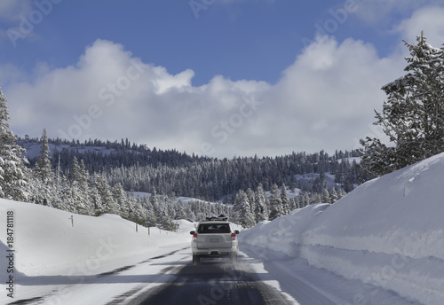 Driving in snow forest