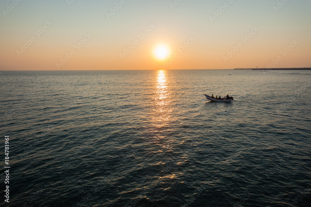 Fototapeta premium Fishing Netting Boat Oars Beach Ocean Dawn