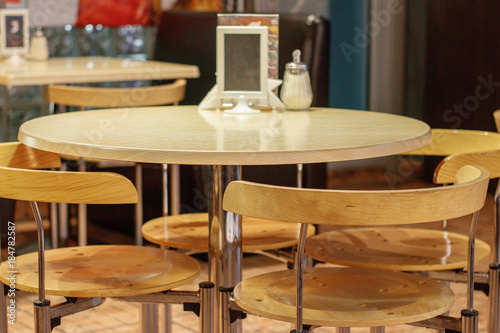 Obraz na płótnie table and chairs in the cosy restaurant w salonie