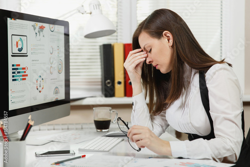 Φωτογραφία Beautiful tired perplexed and stress brown-hair business woman in suit and glass