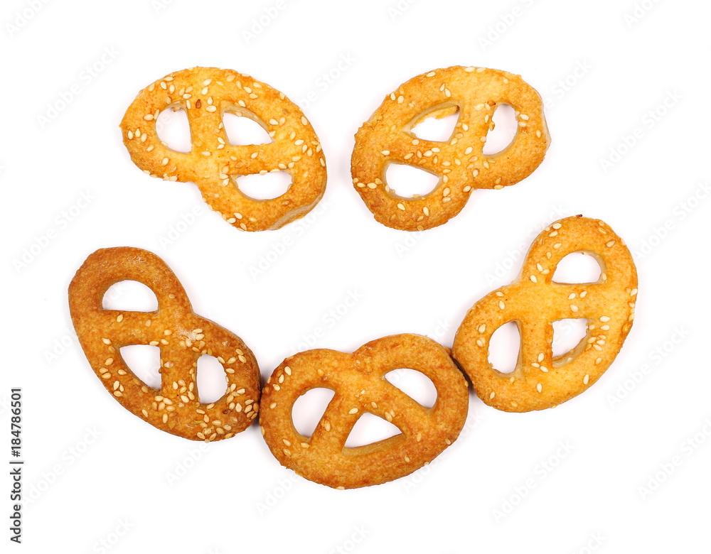 Salty handmade pretzels isolated on white background, top view Salty handmade pretzels isolated on white background, top view