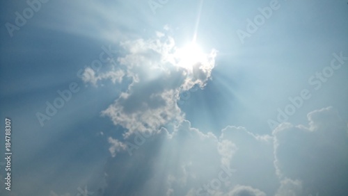 Sun on cloudy sky photo 
