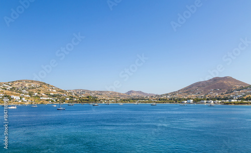 Greece. Cyclades. Paros island. Picturesque white houses near Parikia town. Yachts in the sea © Oxana Morozova