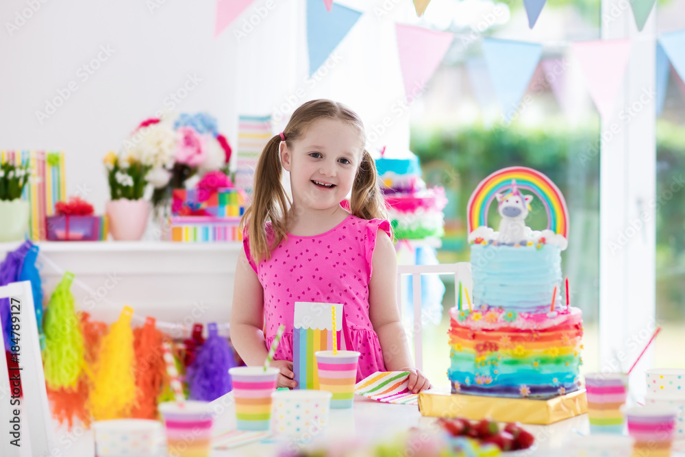 Fototapeta premium Kids birthday party. Little girl with cake.