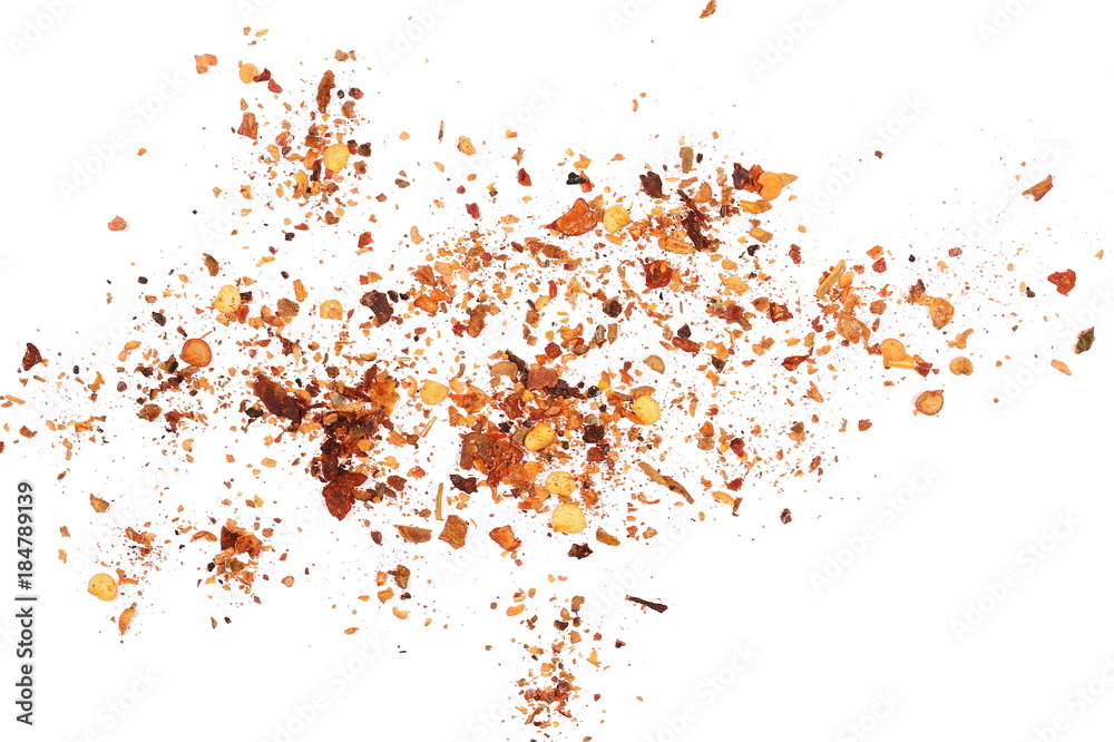 pile crushed red cayenne pepper, dried chili flakes and seeds isolated on white background, top view pile crushed red cayenne pepper, dried chili flakes and seeds isolated on white background, top view